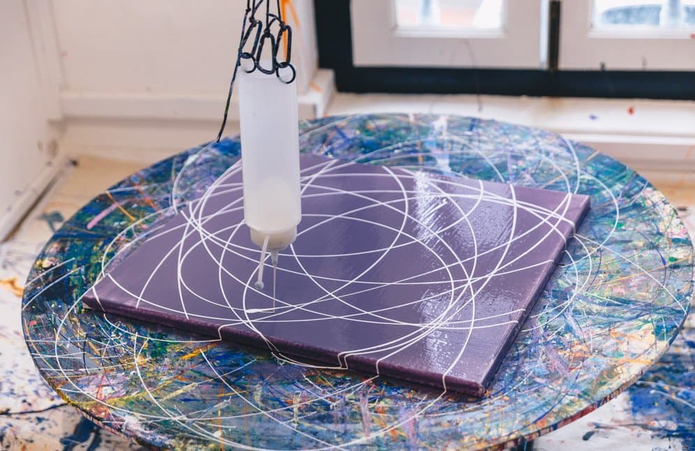Pendulum painting setup in the Motion Art Space studio.